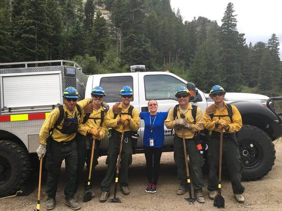 Rachelle with volunteer firefighters